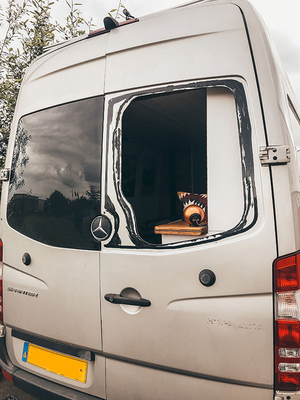 Van Build Mistakes - Our rear window is removed after nearly falling out!