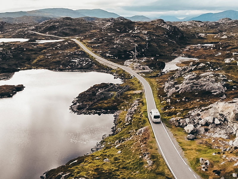 campervan driving along the narrow lanes on Golden Road loop whilst on a visit to Lewis and Harris